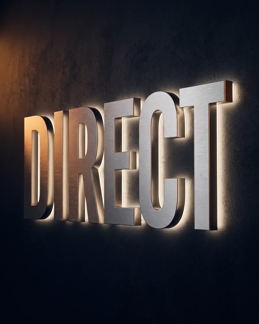 Built-up brushed stainless steel letters with a warm LED halo glow